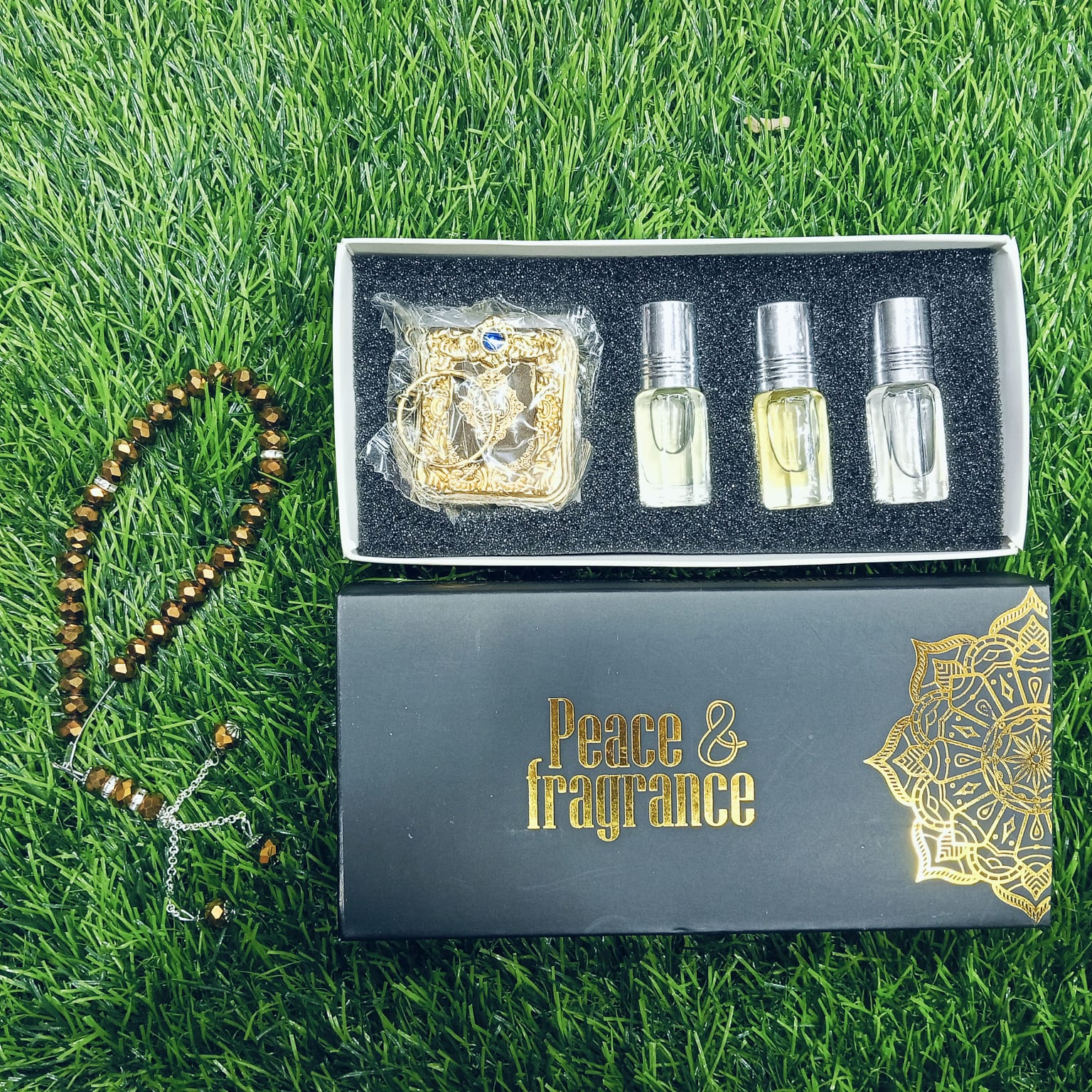 Premium Islamic Gift Combo – Tohuran Non-Alcoholic Attar Set (Classic, Amir-Al-Oud, Rasha, Soft), Crystal Tasbih & World’s Smallest Imported Pocket Mini Quran Sharif Gift Package